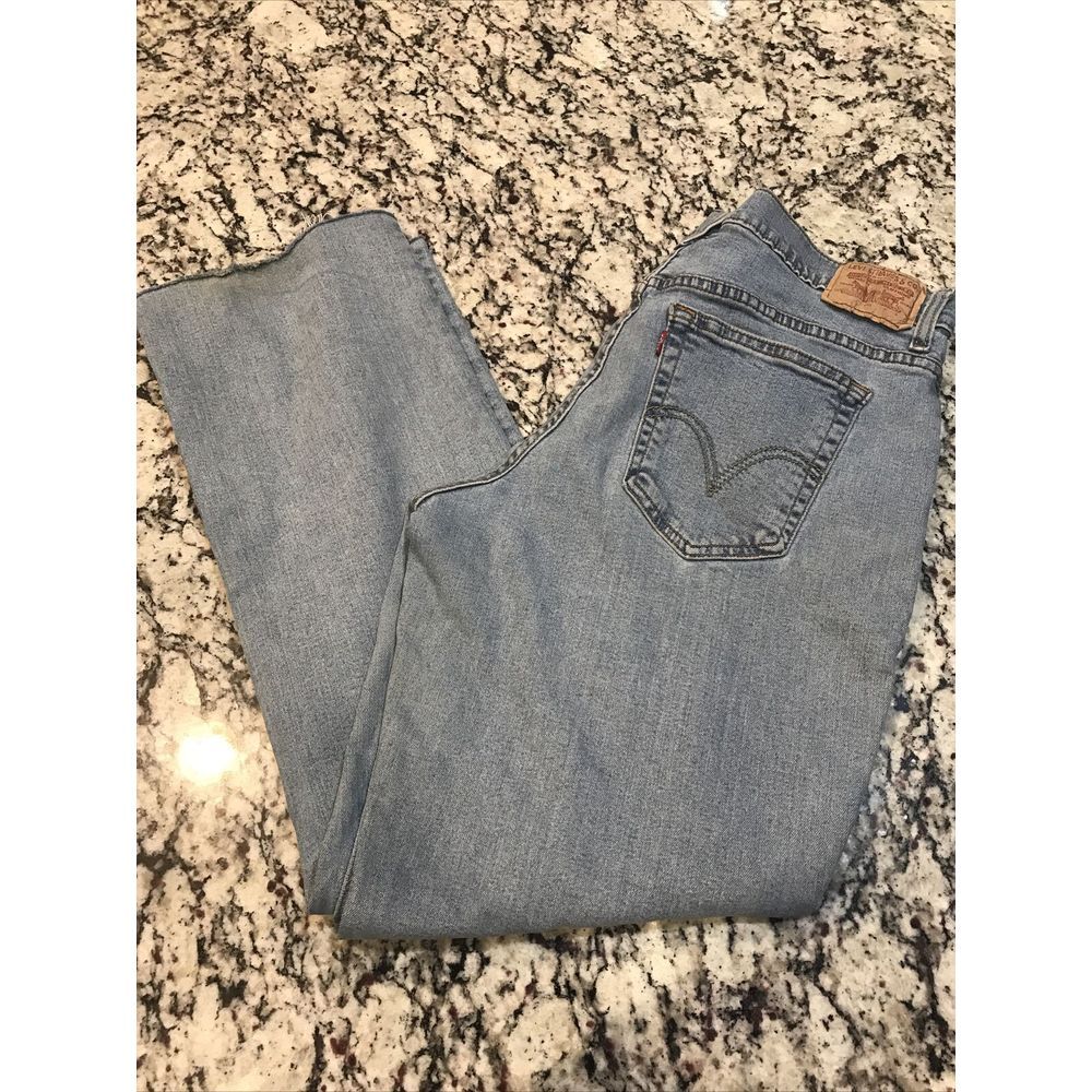 Vintage Levi's 550 Classic Relaxed Mom Jeans 14 M 33 x 29 Distressed Raw Hem